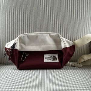 North Face belt bag; maroon & cream. Mint condition.